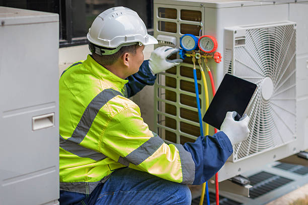 Professional Air Duct Cleaning technician working in Wheatland, WY